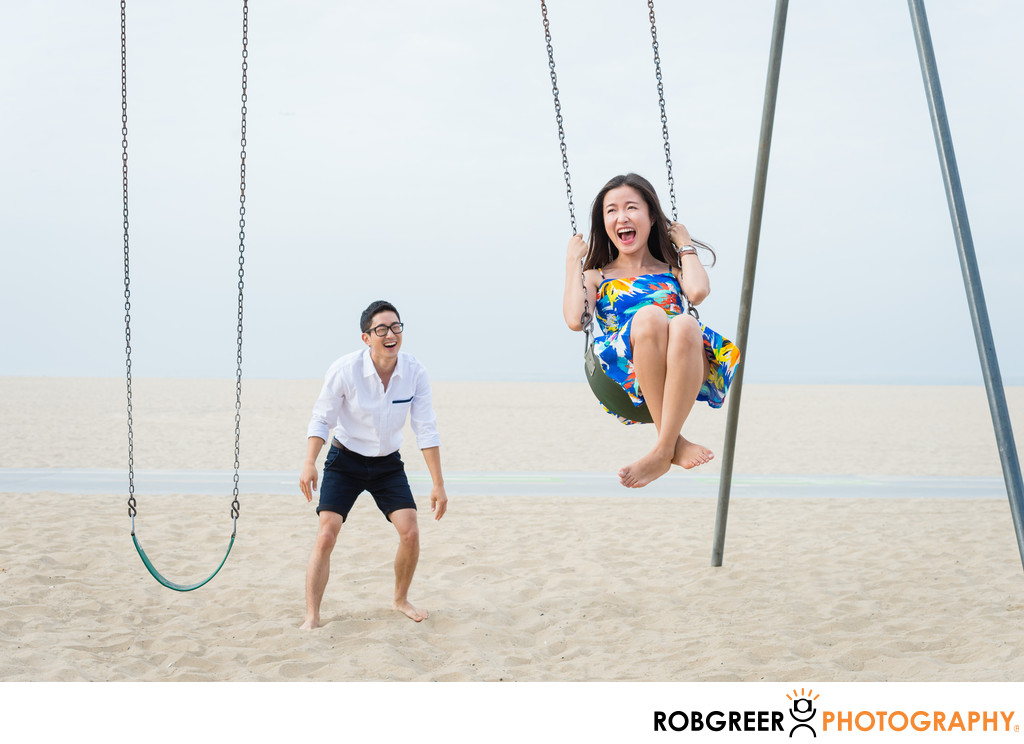 Asian Couple on Swings