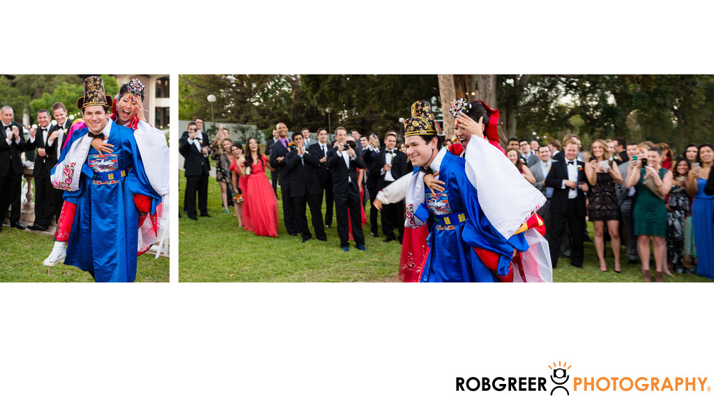 Groom Carries Bride