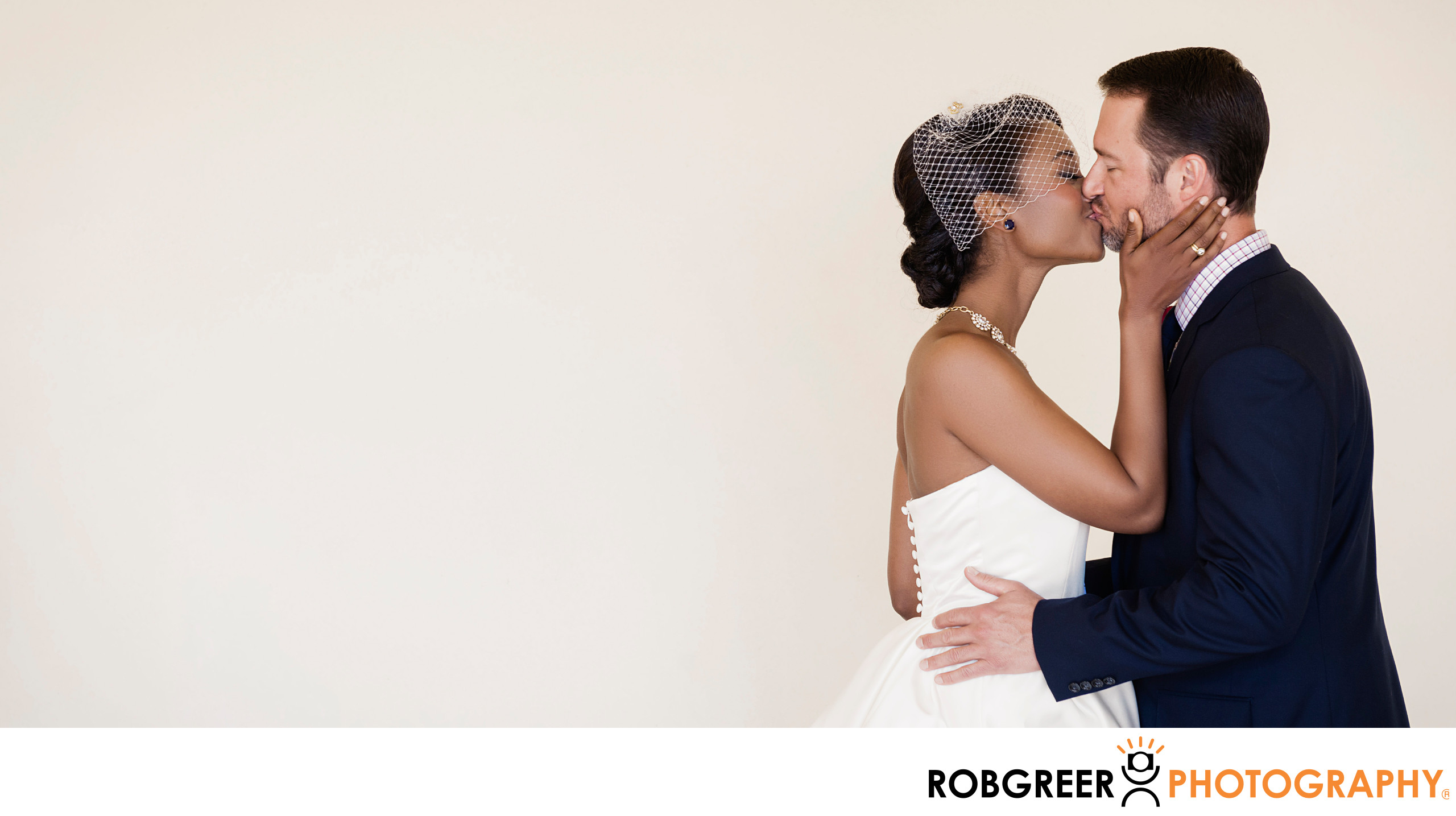 Bride and Groom Kissing Happily Against Blank Wall - Terranea Resort Wedding Album: Rancho Palos ...