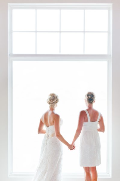 Brides Holding Hands: Gay Wedding