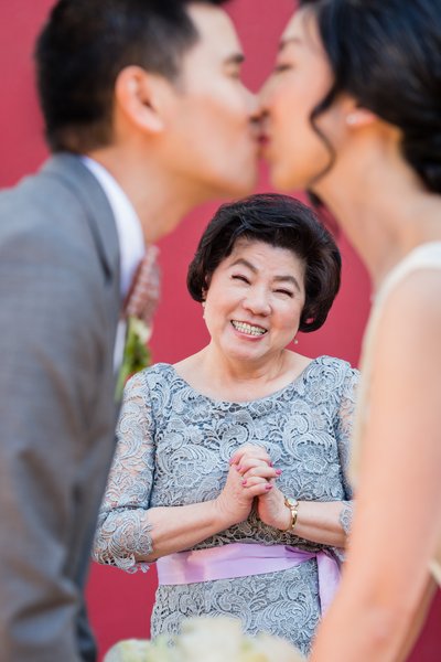Mother of the Bride Watches Kiss